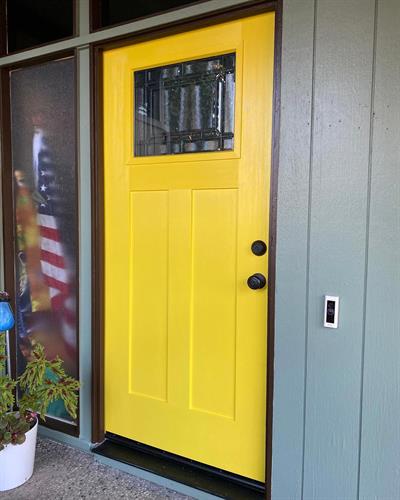 Yellow door on a Streng Home