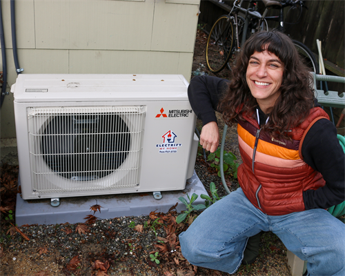 Gallery Image Happy_Customer_with_heat_pump.png Gallery Image Happy_Customer_with_heat_pump.png