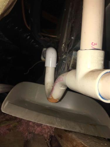 Condensate leak held by a dust pan