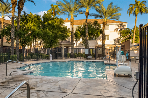 Enjoy an evening cocktail poolside