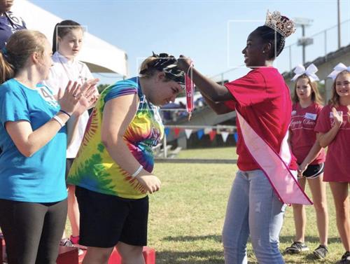 The Queen Handing Out Medals in the Special Olympics The Queen Handing Out Medals in the Special Olympics