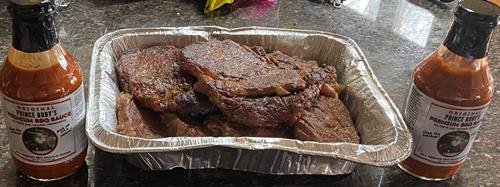 Completed Rib Eye Steaks with special Beef marinade....waiting for PR's Premium BBQ Sauce.....or without sauce.......either way, they are phenomenal.....you won't be disappointed!!!!"