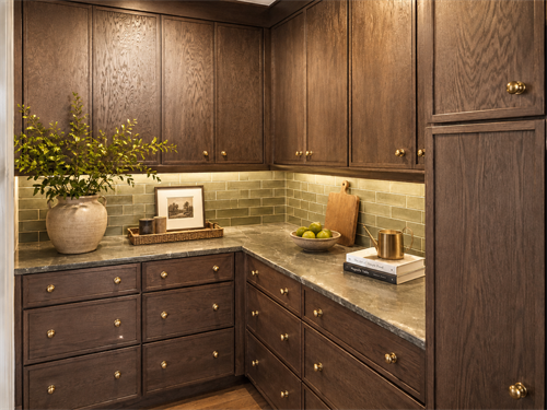 Beautiful Oak cabinets in an inviting pantry