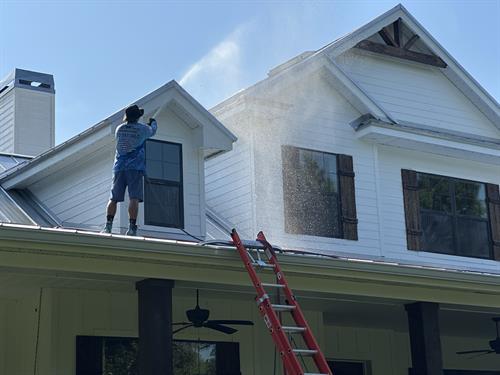 Professional exterior cleaning in progress