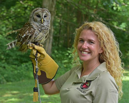 Naturalist Sarah with Bart the barred owl