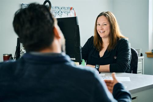 VP of Operations & Finance Jennifer Endicott meets with an engineer to align on priorities and progress.