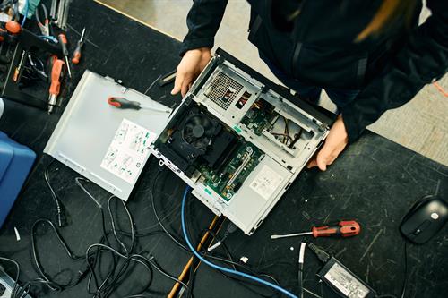 Hands-on and hardware-ready—Clarity team keeping systems running from the inside out.