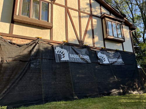 Badgerland Exteriors & Solar crew in action: Property protection practices on multi-family property in Madison, WI