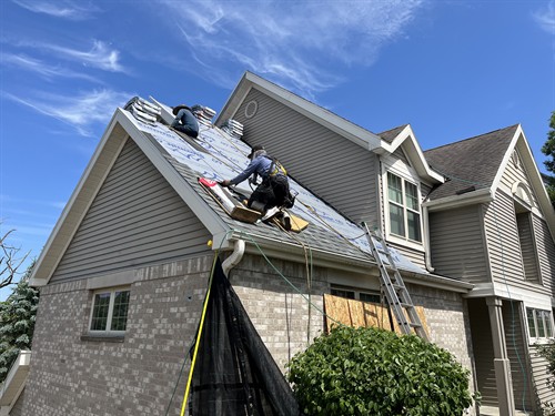 Badgerland Exteriors & Solar crew in action: Multi-family roof replacement in Madison, WI
