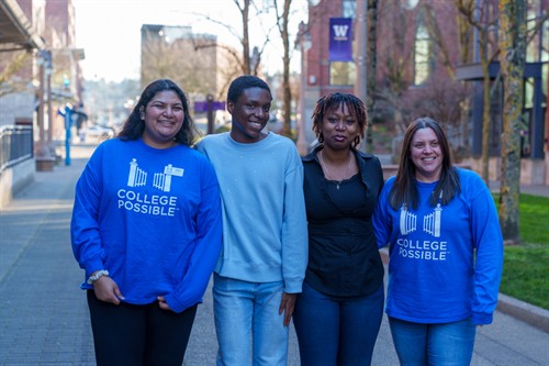 Gallery Image 4_people_outside_with_UWT_flag_in_background.jpg