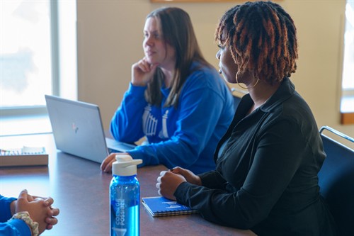 Gallery Image Coach_Julie_and_Zaire.jpg