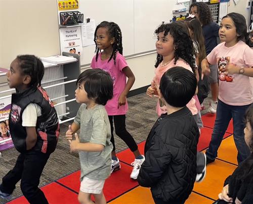 Students dancing in classroom