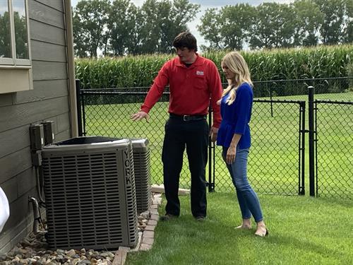 Service Technician Luke consulting with a customer.