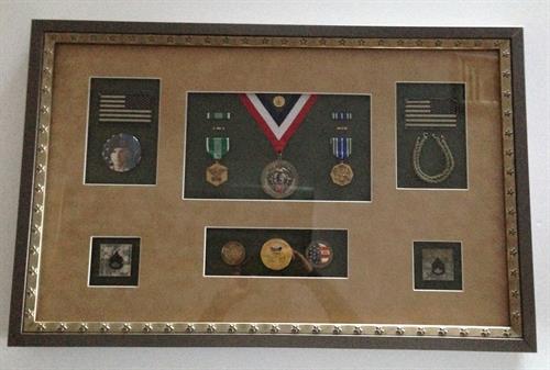 Shadowbox of military honors earned by local resident.