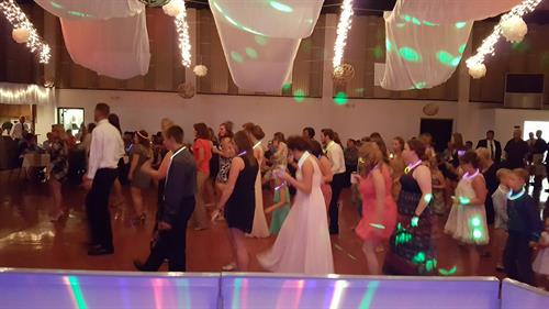 group line dancing at a wedding  DJ point of view 