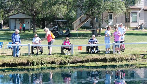 LifeQuest employees and the people that they support enjoy a day of fishing!