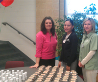 RFCU staff members Dana Marcee, Melinda Barbosa and Gina Wood are ready to give away attendance gifts at our 2013 annual meeting.
