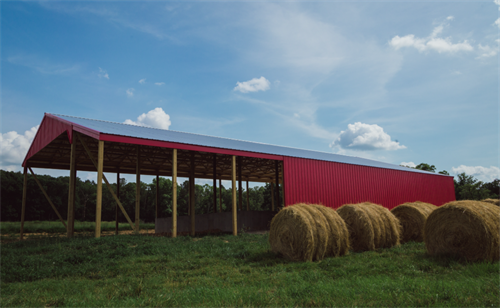 Red Hay Barn with White Roof