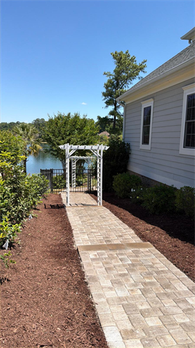 Professional landscape and paver patio walkway installation in Chapin, South Carolina. 