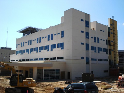 Cardiovascular Stroke Center  This project included the construction of a new Cardiovascular Stroke Center at the existing Memorial Health Systems of East Texas facility. The Patient Tower is four stories in height, and was constructed with the structural capacity to support three additional floors in the future. The project also included a heliopad which was constructed on the roof, pavements, and the expansion of the Central Plant.  
