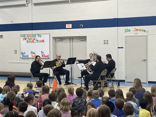 Portsmouth Brass Quintet visits a school to provide educational workshops and performances, October 2025.