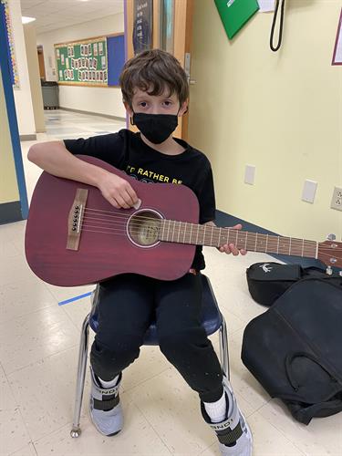 A student musician from Lebanon, ME with his new acoustic provided by CAC (October 2021). 