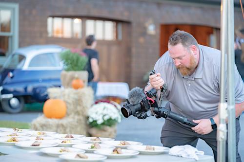 Filming a dinner service