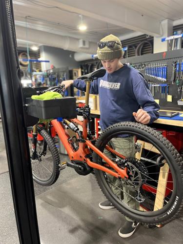 Tanner working on a Specialized Turbo Levo e-mtb