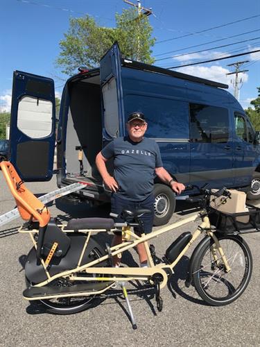 Steve Gerhartz off to deliver a Yuba cargo e-bike