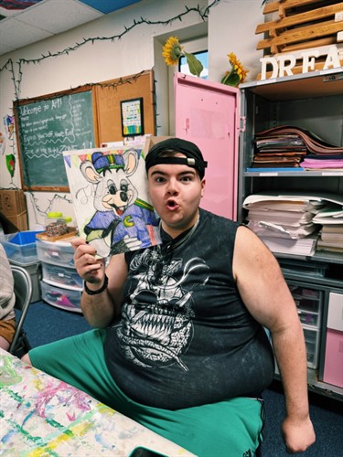 Gallery Image Josh_with_Painting.jpeg