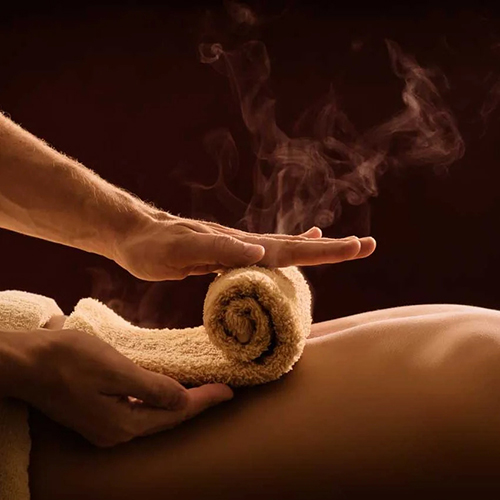 Hot towel massage at Souma