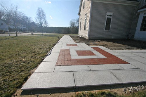 Salt and Pepper Granite Walkway with Clay Brick Detail