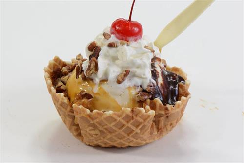 One of our delicious sundaes in a handmade waffle cone