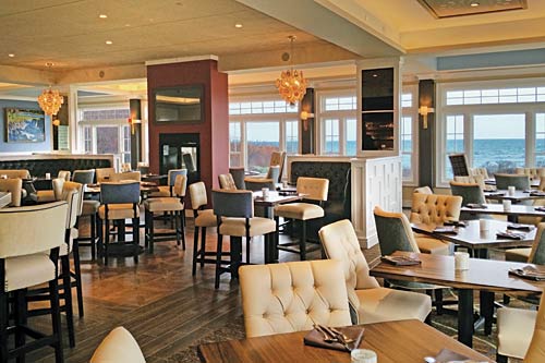 Overview of Shearwater at Stage Neck with Bar, High Top Tables, Banquette Booths, and Oceanfront Dining Tables.