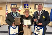 Dr. Victoria Constance of Children’s Safe Harbor receives the Community Builders Award from Montgomery #25 of the Grand Lodge of Texas.