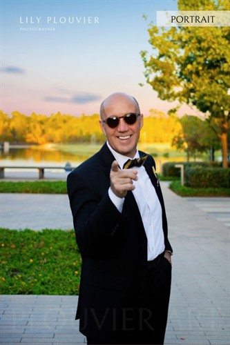 Executive portrait at golden hour by the water — outdoor branding session in Montgomery County