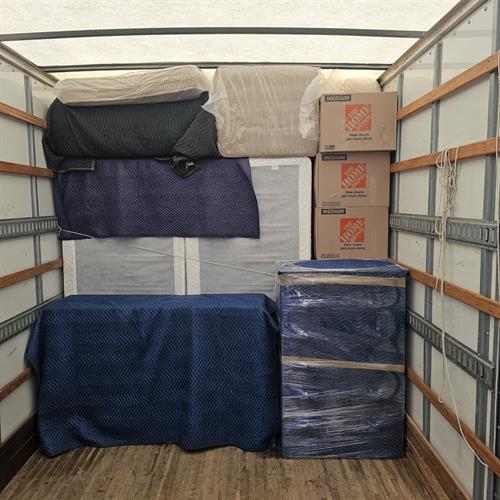Properly stacked box wall on moving truck