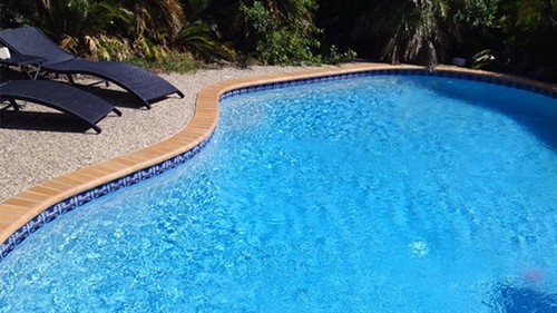 Balanced, swim-ready water and clean tile lines following a routine Poolie service visit.
