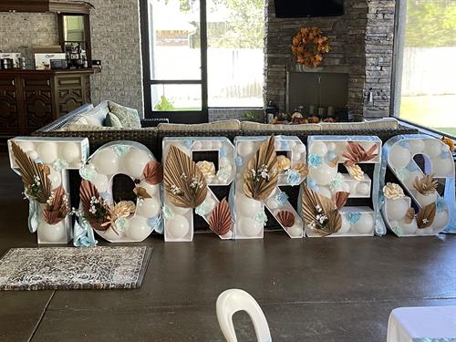 Mosaic letters. Starting at 12 inches and go up to 4 feet. Purchase or rent