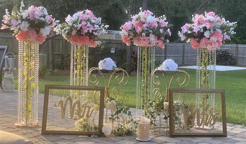 Wedding centerpieces, wedding Isle runner. Wedding Arbor, wedding floral arrangements. Can be purchased or rent it