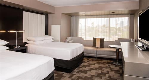 Stylish rooms with local art, city views, open closets, and versatile multi-use surfaces. Stylish rooms with local art, city views, open closets, and versatile multi-use surfaces.