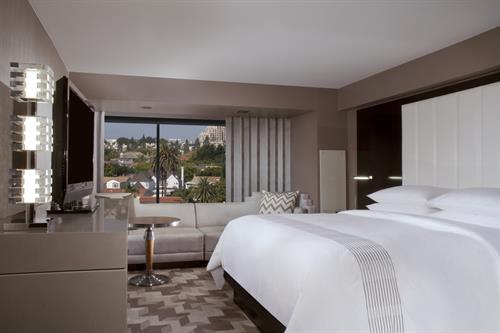 Beautifully maximized space with platform beds and wall-mounted flat-screen TVs Beautifully maximized space with platform beds and wall-mounted flat-screen TVs