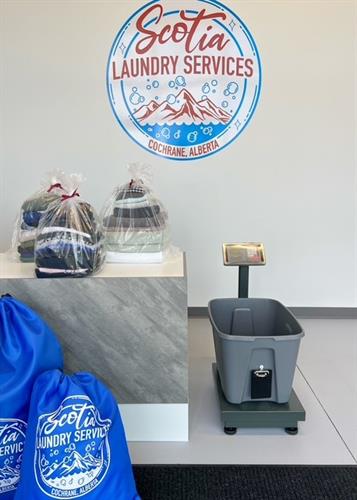 Your laundry is then brought to our store in Cochrane where it is weighed, checked and seperated into colours & whites.