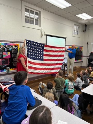 Flag etiquette classes with the 4th grade class at Fairview Elementary  