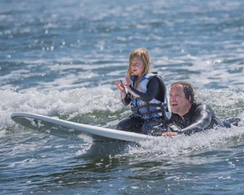 Surf therapy is a non traditional method of therapy utilizing the ocean to increase core strength, coordination, balance and sensory input. These abilities are all impacted by seizures and pharmaceuticals 