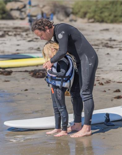 Surf therapy is a non traditional method of therapy utilizing the ocean to increase core strength, coordination, balance and sensory input. These abilities are all impacted by seizures and pharmaceuticals 
