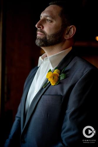 Gallery Image Groom_with_yellow_boutonniere.jpg