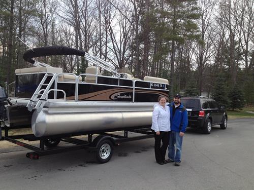 Another Happy Family with their new Sweetwater pontoon