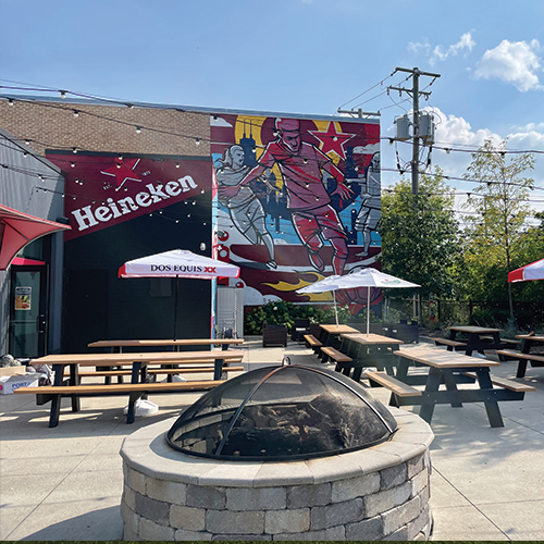 Visit Heineken Pub97’s outdoor patio to grab a beer and enjoy our outdoor fire pit.