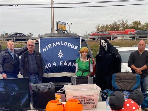 Passing out candy at the State Police Trunk or Treat event